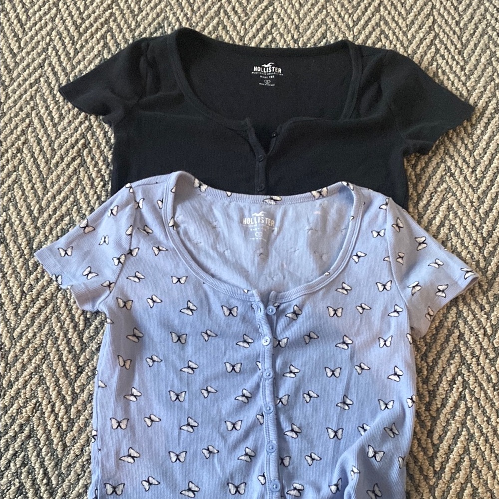 Bundle or Two Hollister Must Have Baby Button Down Tees. Periwinkle and Black!